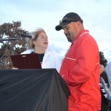 Lemoore City Councilman Ray Madrigal presents the Congressional Record plaque to Betty Warkentin.